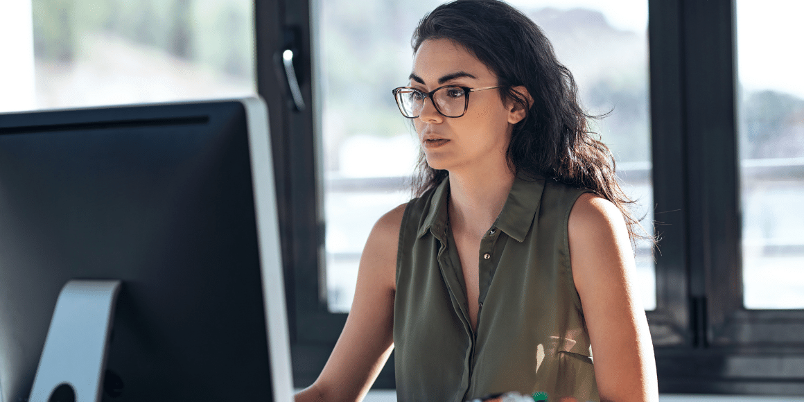 woman working at computer in an office setting