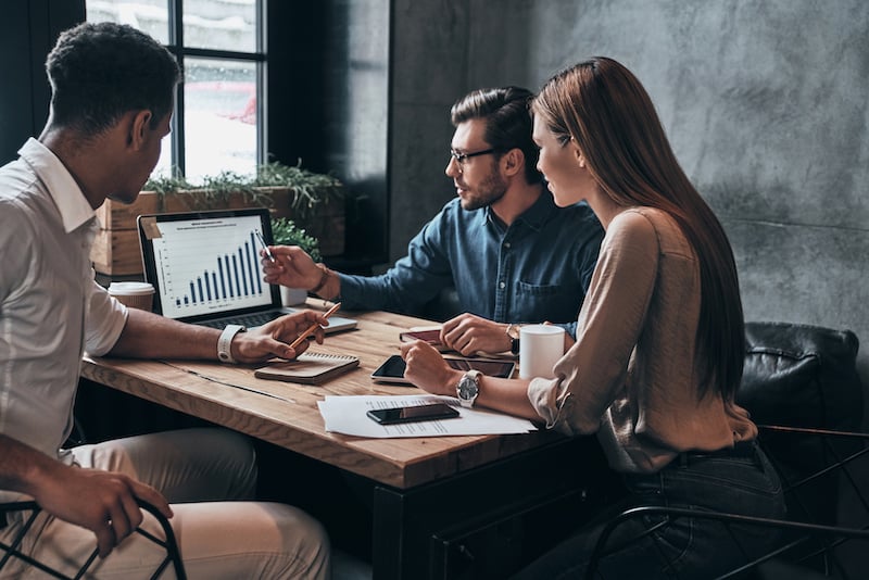 marketing team discussing metrics