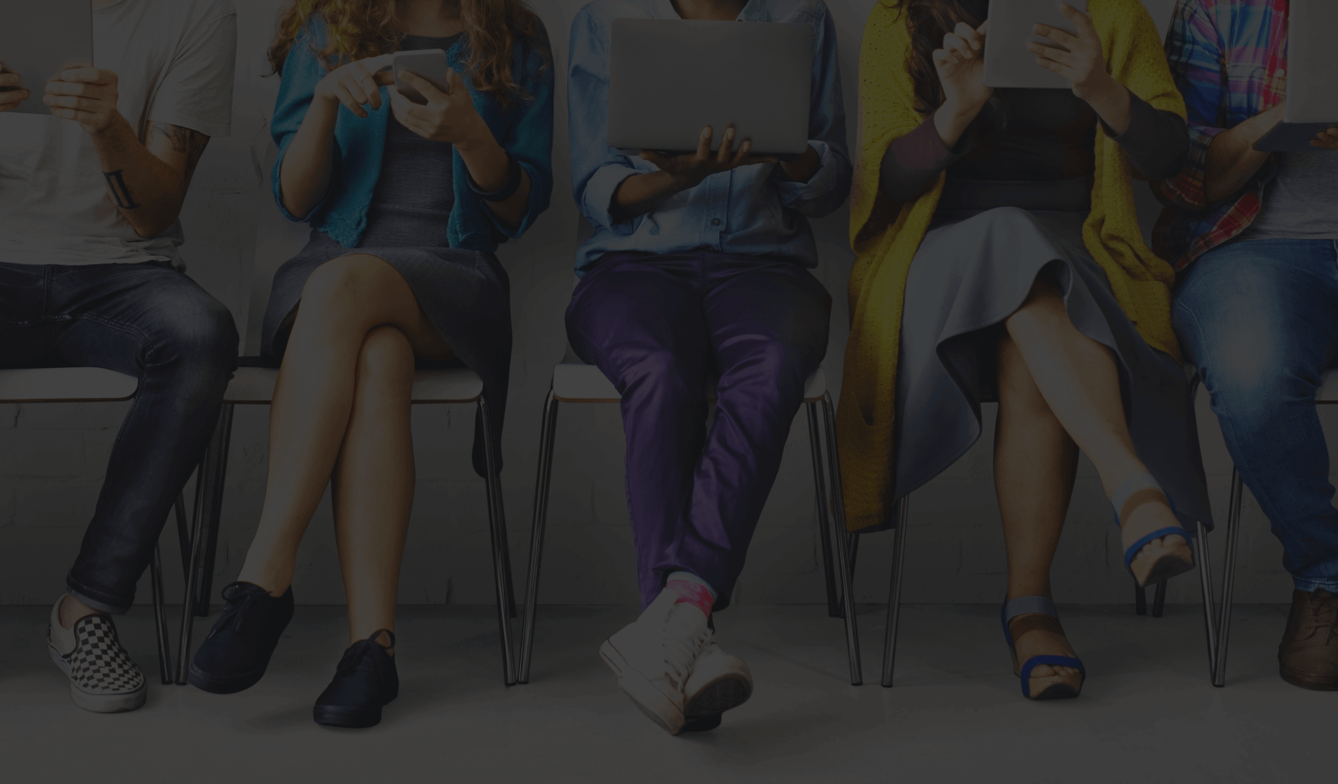 Five people on various devices