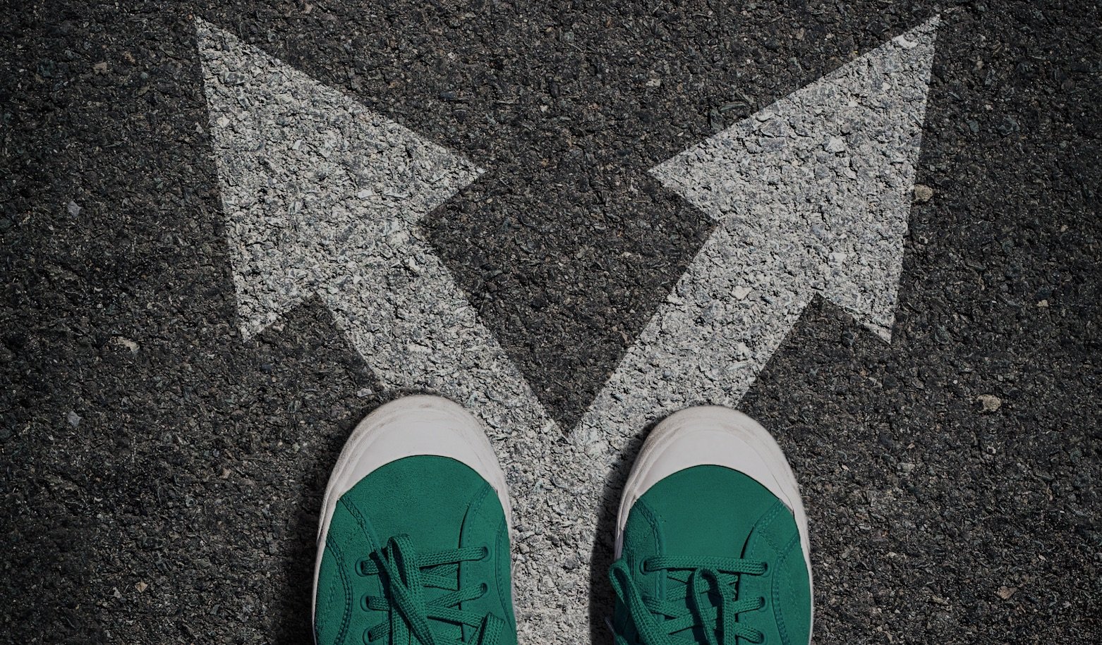 Pavement with feet and arrows