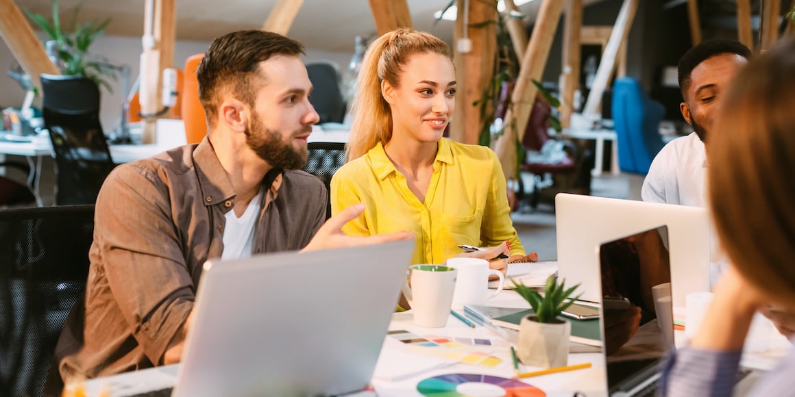 Two marketers at a conference table