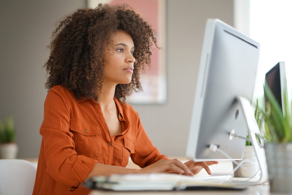 Woman shopping online on desktop 