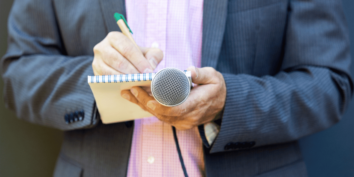 Microphone with notepad and pen