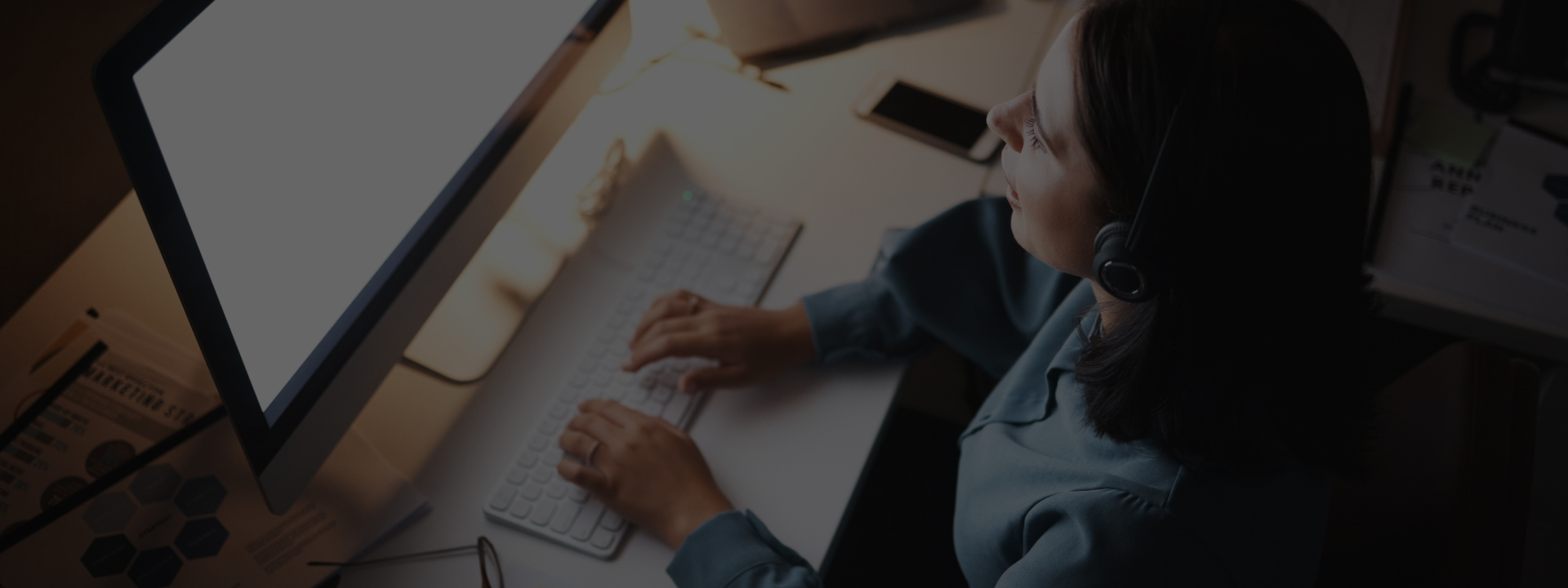 Woman typing on her computer