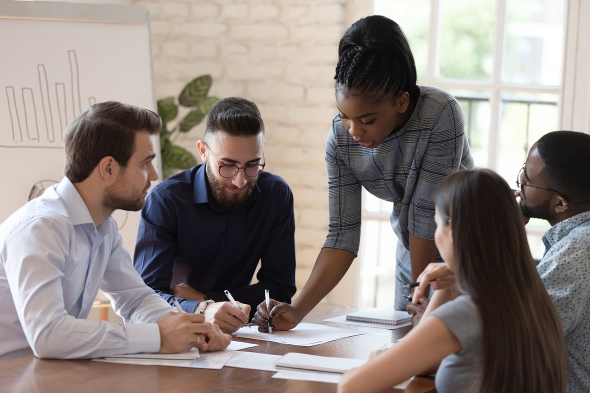 Four people in a work meeting