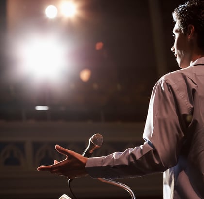 Speaker talking to a large audience