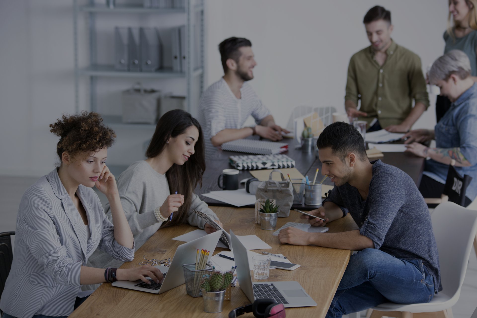 Employees working at a desk