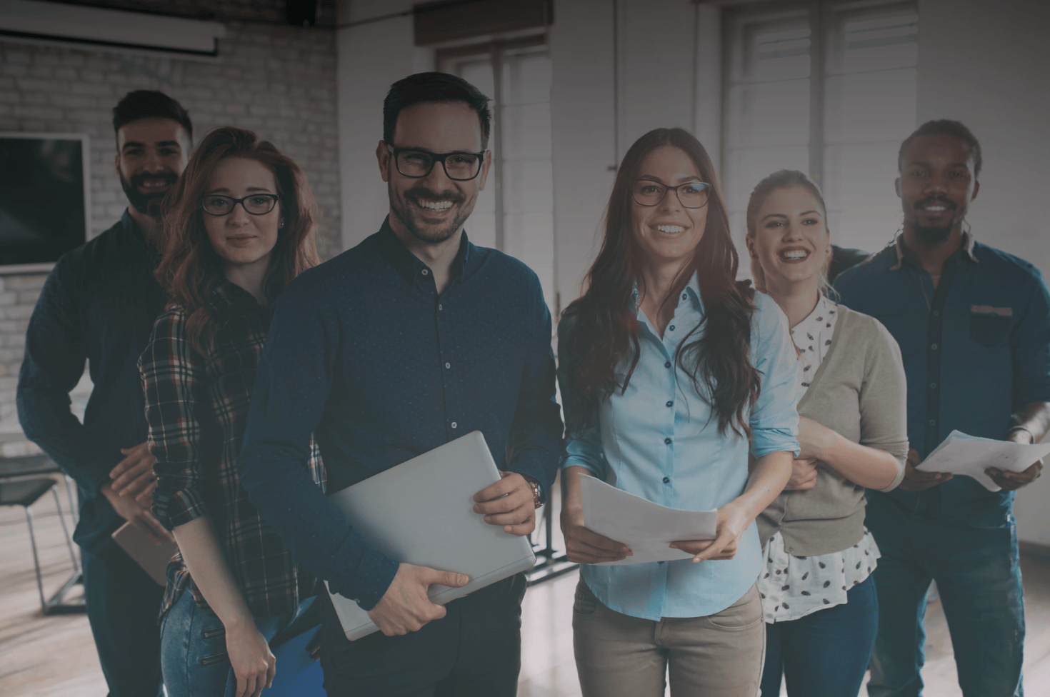 employees standing in a group