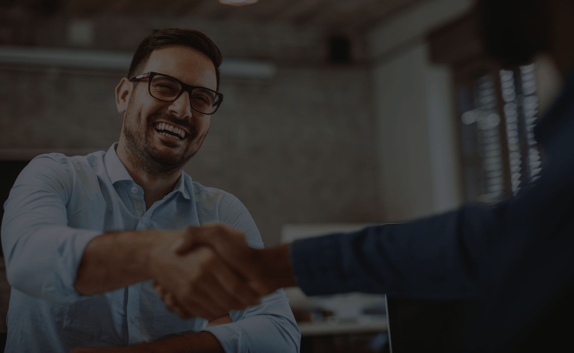 Two people shaking hands