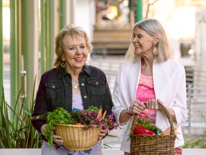 senior women with baskets