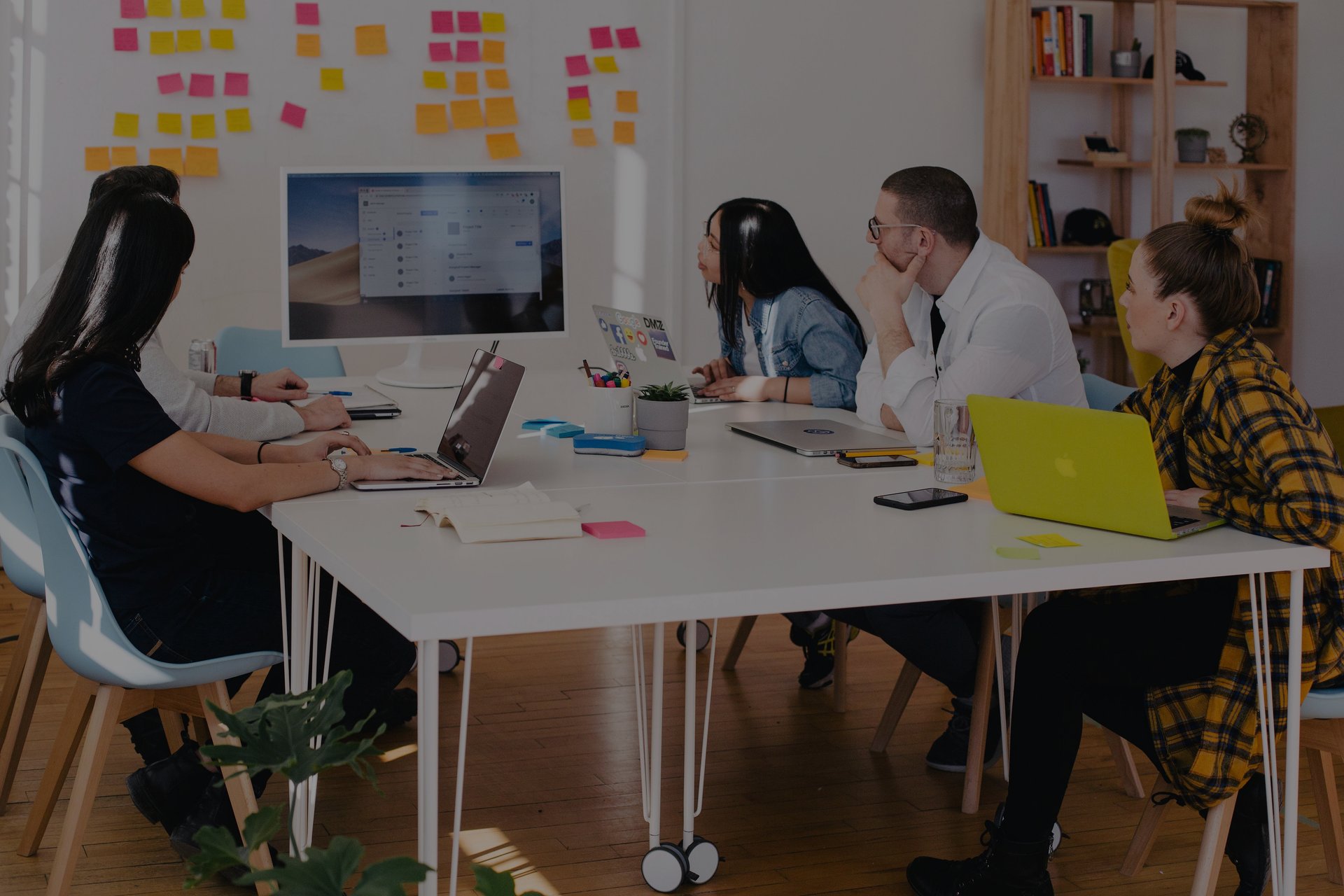 employees at a table working